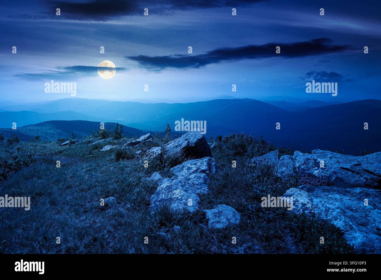 Carpathian mountain landscape in summer at night. scenic view of Transcarpathia region from the mnt. Smooth. alpine blueberry field with rock on the P Stock Photo