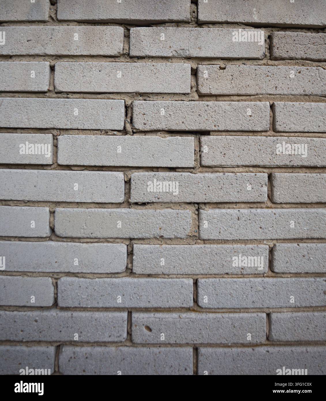 Texture of gray rectangular brick wall in full frame background Stock Photo