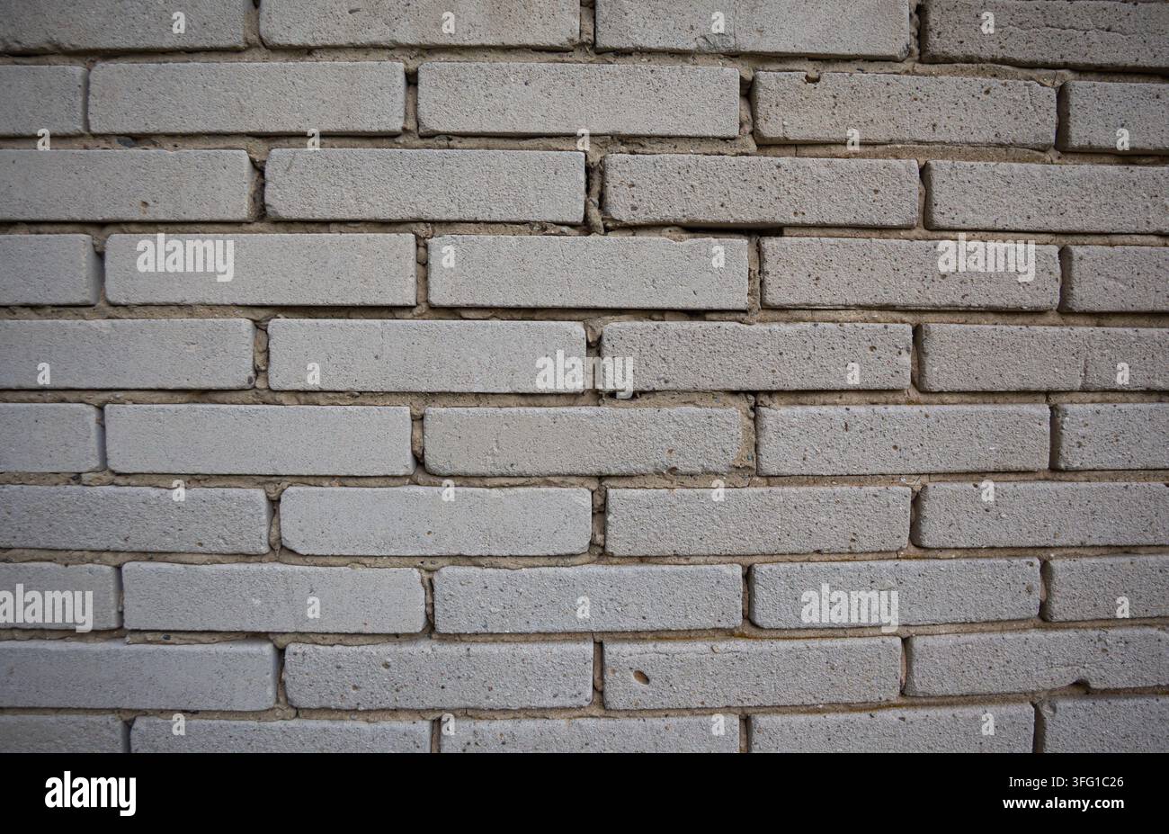 Texture of gray rectangular brick wall in full frame background Stock Photo