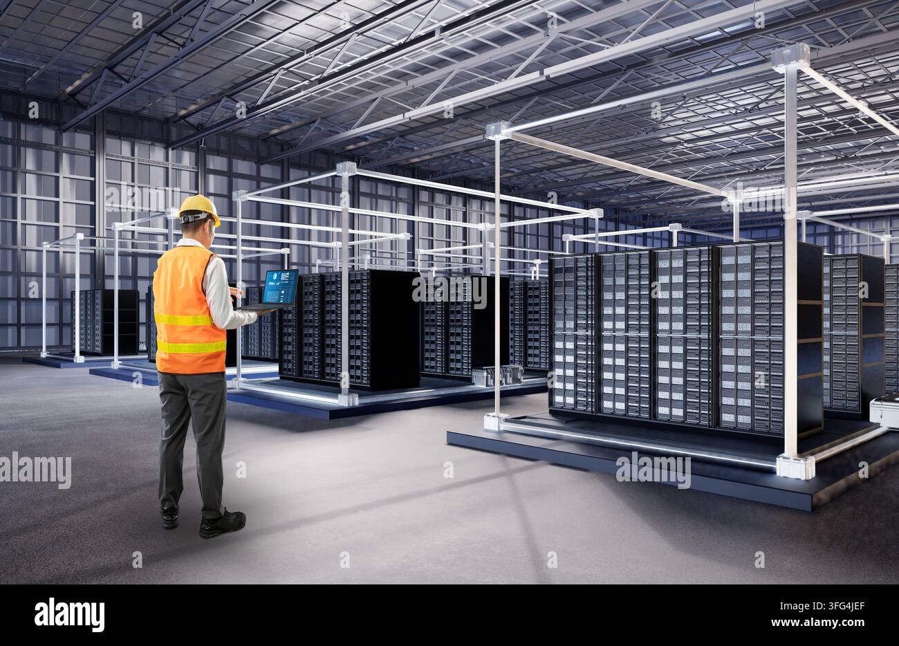 Programmer or engineer with computer notebook work in data center or server room Stock Photo