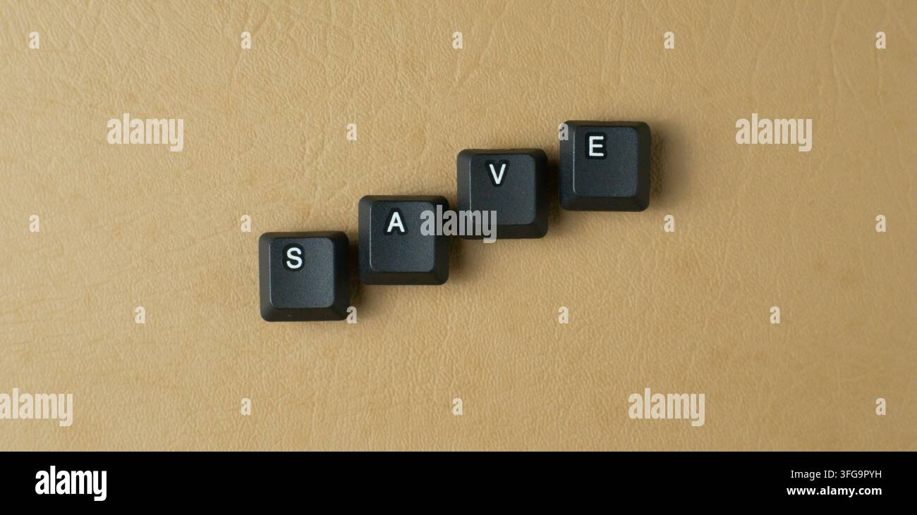 Save Word Made From Keyboard Keys On Beige Background Stock Photo