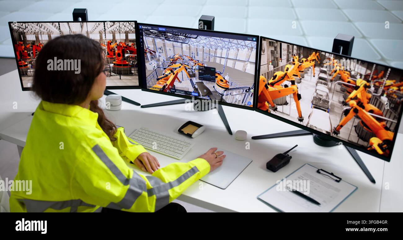 Female Engineer Closely Monitors Automotive Plant’s Robotic Assembly Line Using SCADA Software. Stock Photo