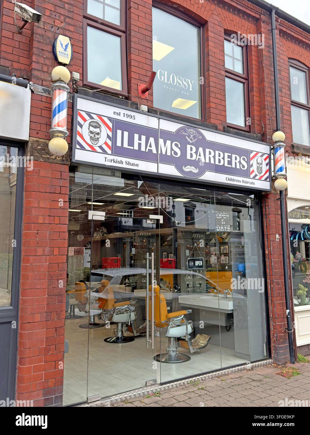 Ilhams Barbers independent Turkish barber shop in Stockton Heath, Warrington, Cheshire, England, UK. Stock Photo