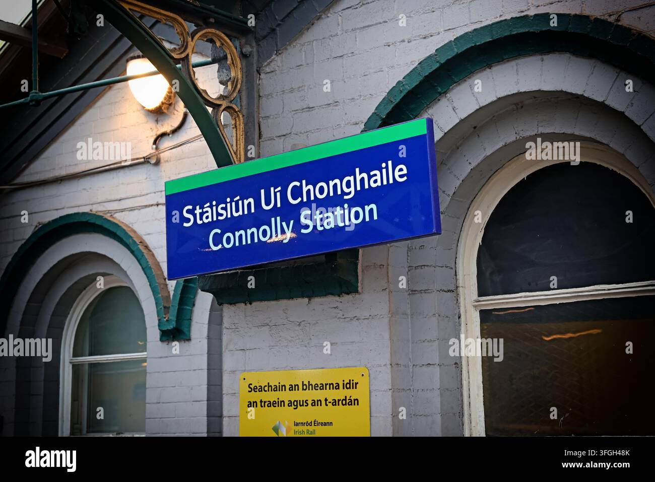 Bilingual Dublin Connolly railway station sign, Dublin, Ireland. Stock Photo