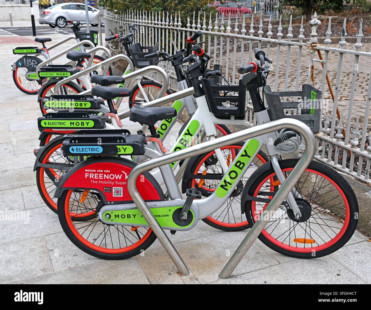 MOBY shared electric hire bikes parked in Bray, County Wicklow, part of the town's app-based public e-bike scheme. Stock Photo