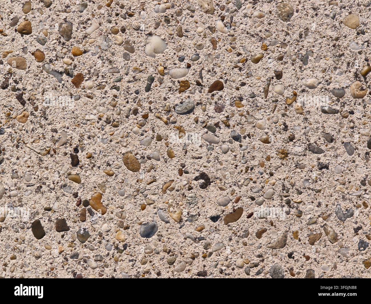 Exposed aggregate concrete texture background with small pebbles Stock Photo