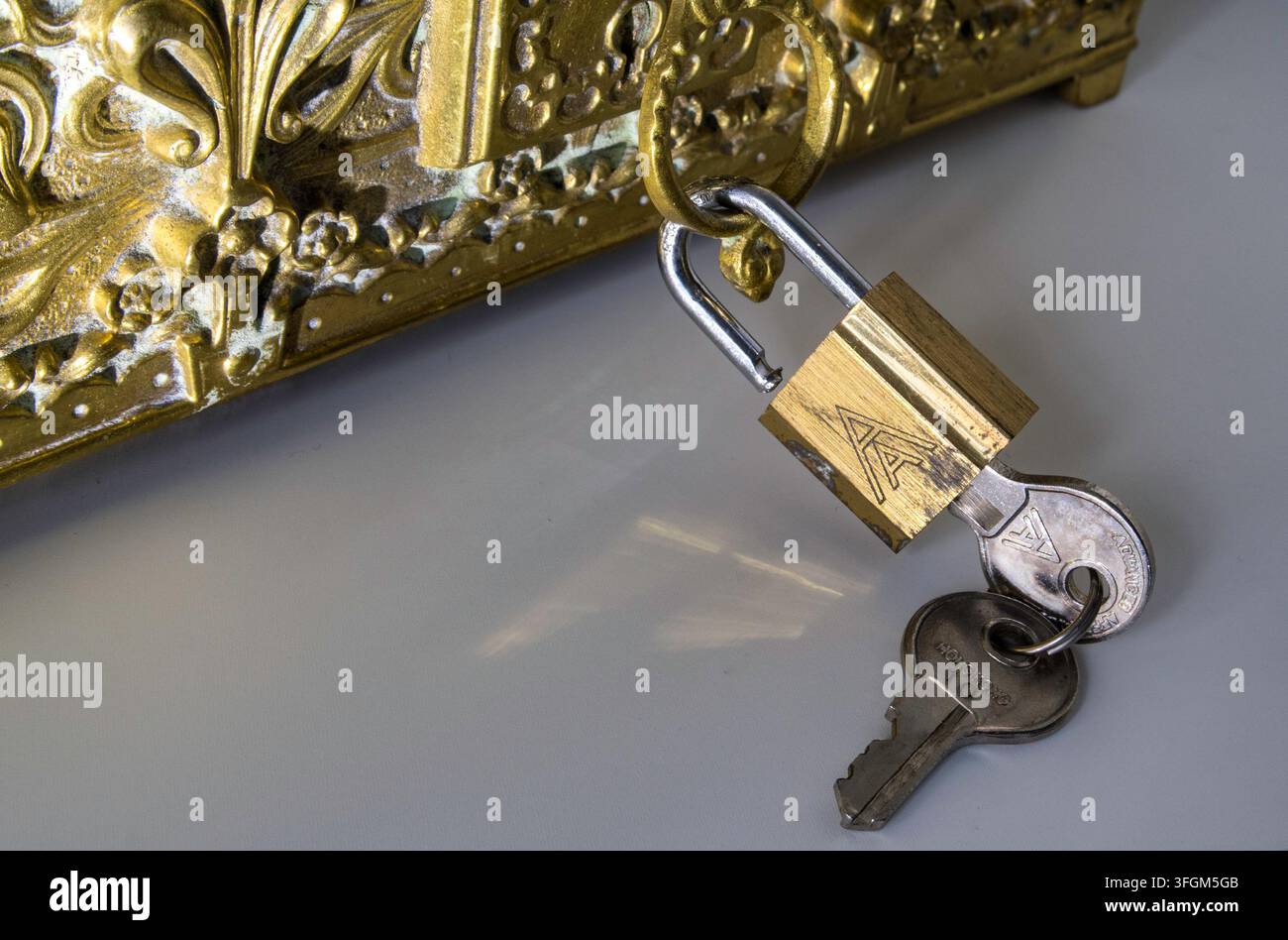 Vintage solid brass padlock with keys, USA Stock Photo
