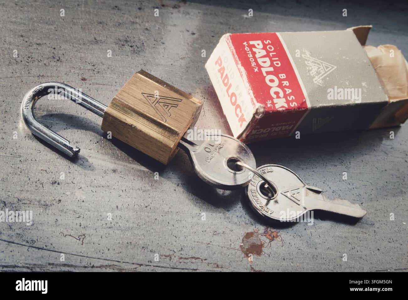 Vintage solid brass padlock with keys, USA Stock Photo