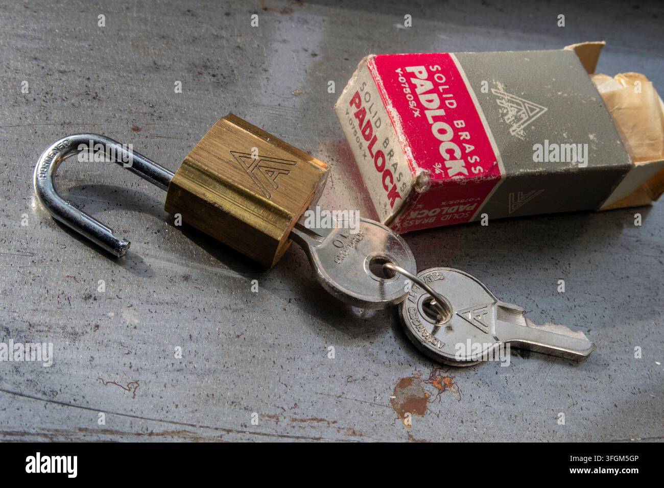 Vintage solid brass padlock with keys, USA Stock Photo