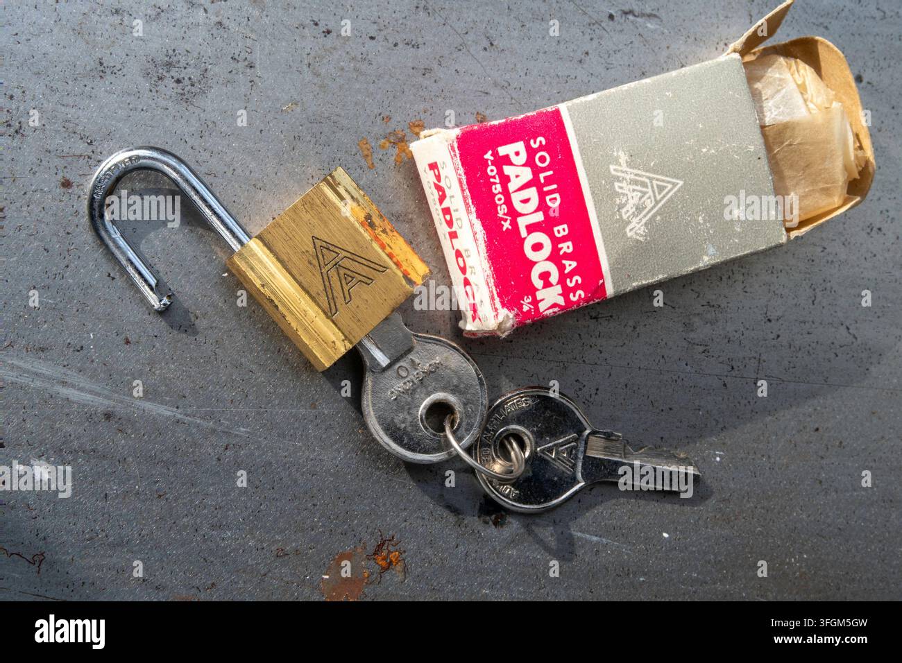 Vintage solid brass padlock with keys, USA Stock Photo