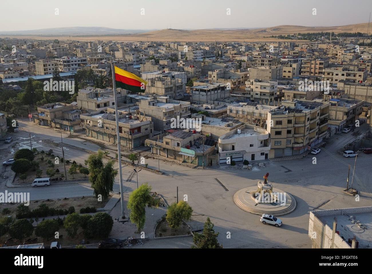 a-kurdish-flag-flies-over-central-kobani-northern-syria-sunday-sept