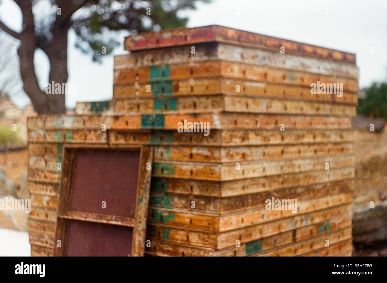 Stack of Weathered Wooden Construction Materials Outdoors Stock Photo