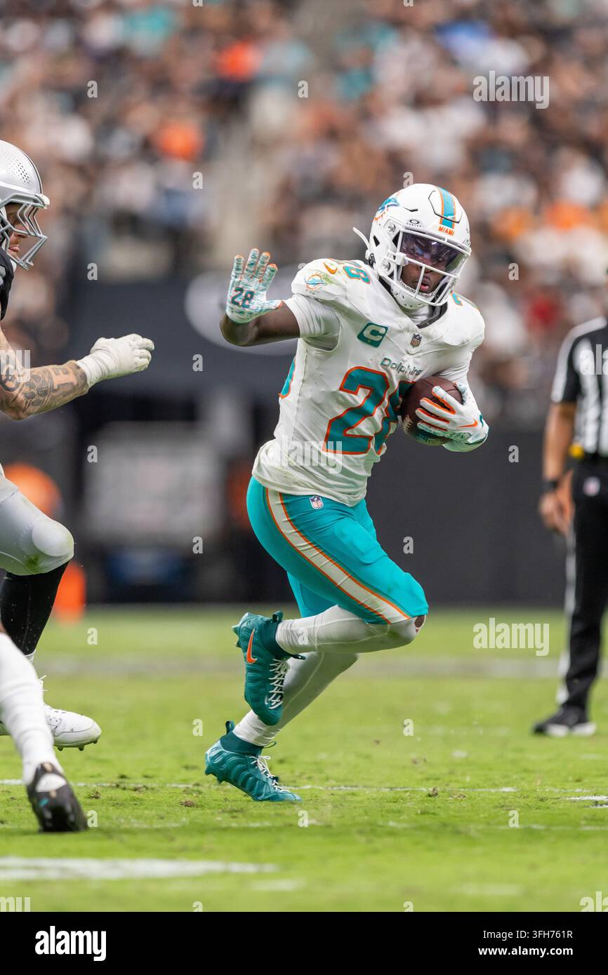 -2 deductive coding categories for phase 1 analysis |... Miami Dolphins running back De'Von Achane (28) runs the ball against ...