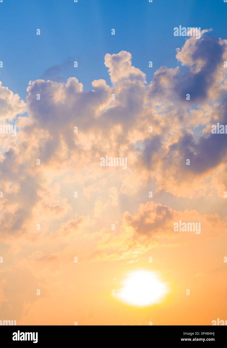 Bright sun shining through cloud layers sky. Stock Photo