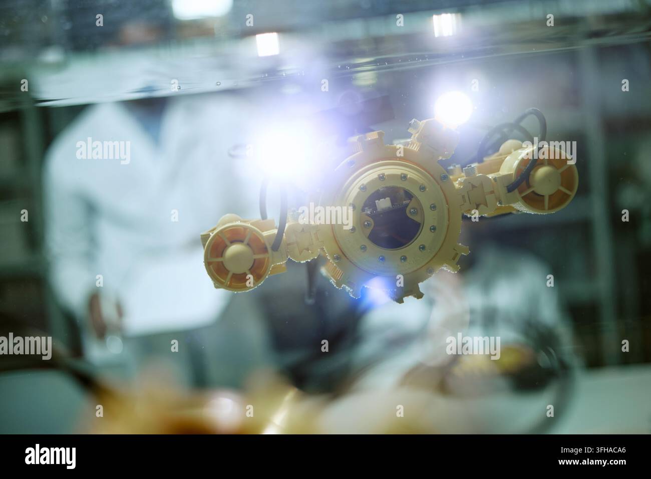 Scientists Testing Robotic Underwater Drone in Laboratory Tank Stock Photo