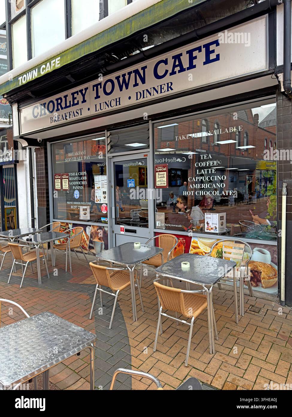 Chorley Town Cafe at 36 Chapel Street in Chorley, Lancashire, with pavement tables outside the independent cafe. Stock Photo