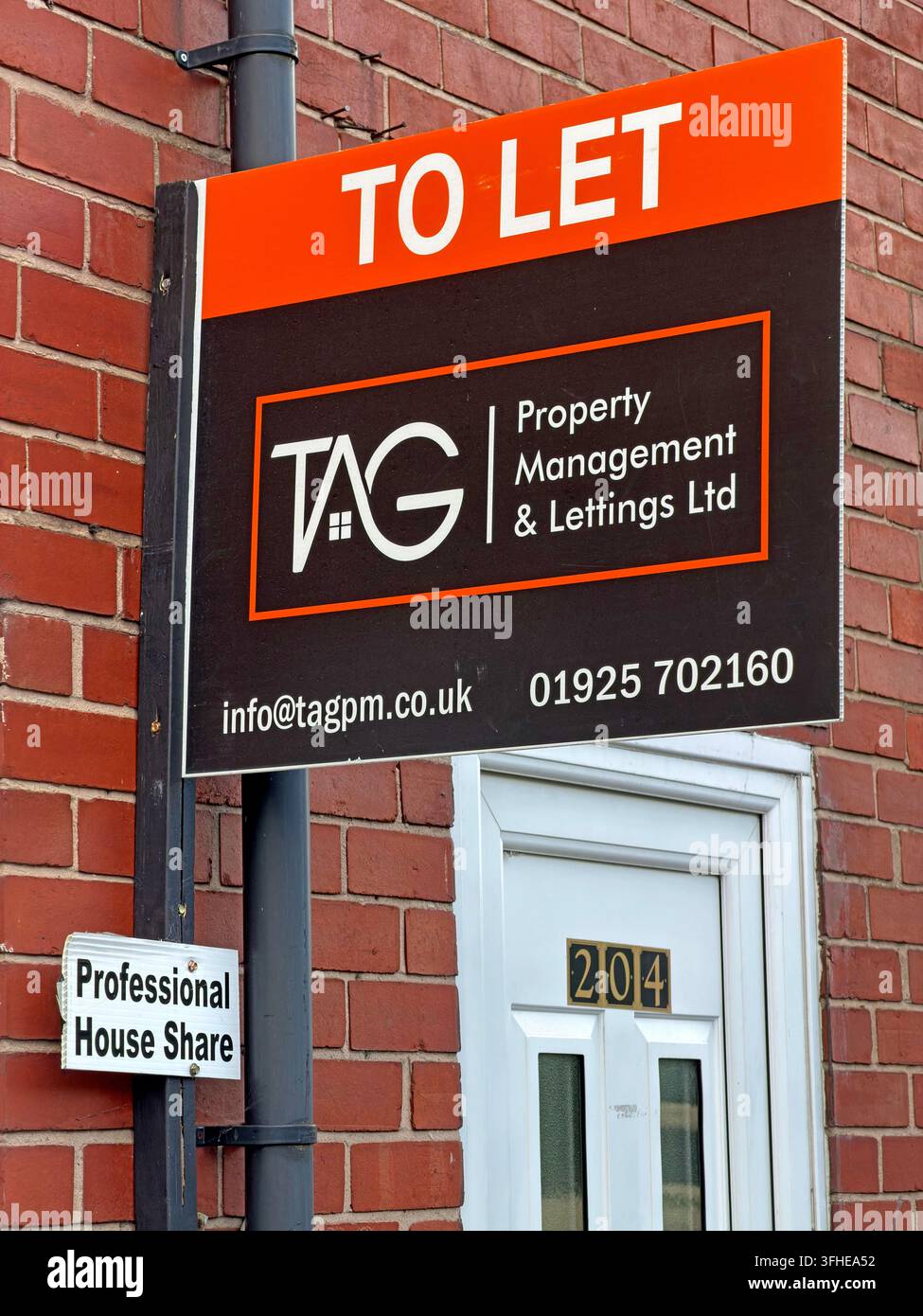 To Let sign advertises a professional house share property in Warrington, reflecting the private rental market. Stock Photo