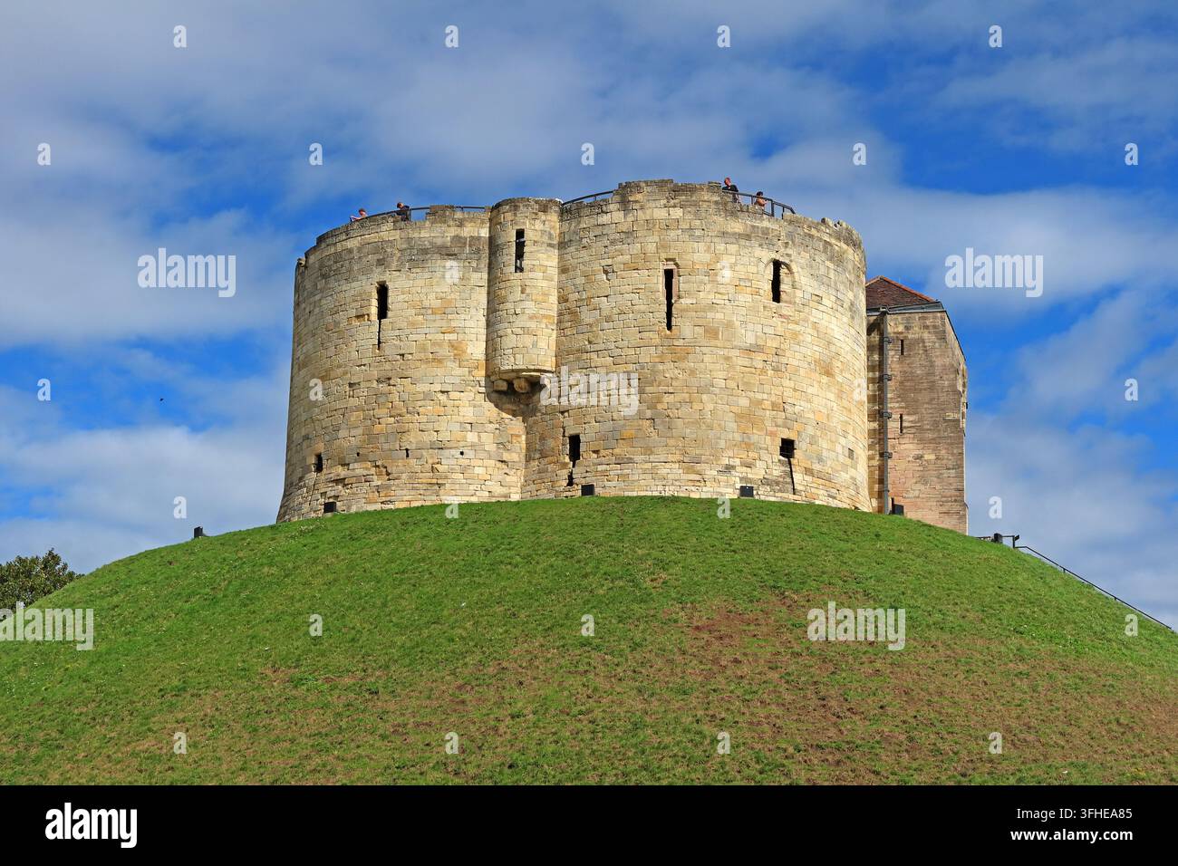 Clifford's Tower, the medieval stone keep of York Castle, stands on its historic motte above York city centre. Stock Photo