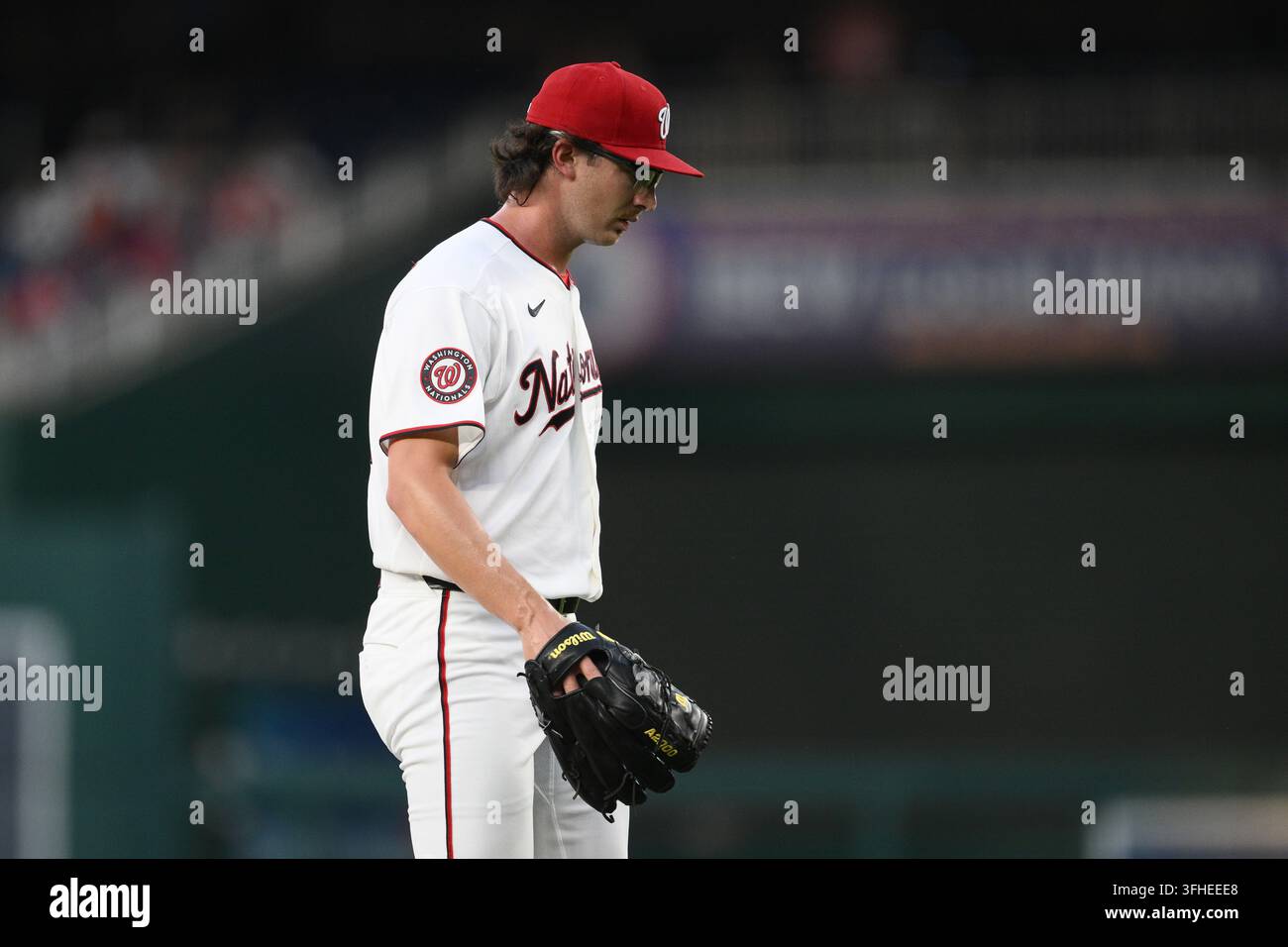 Washington Nationals pitcher Jared Simpson walks back to the dugout ...