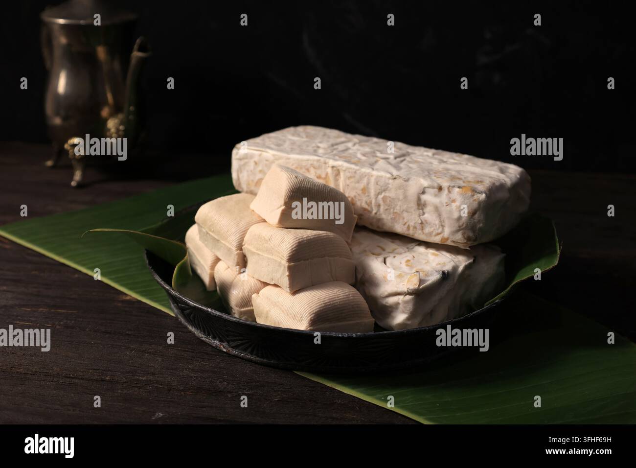 Food Factory Process Stacked tofu and tempeh pieces and soybeans as vegetarian plant protein ...