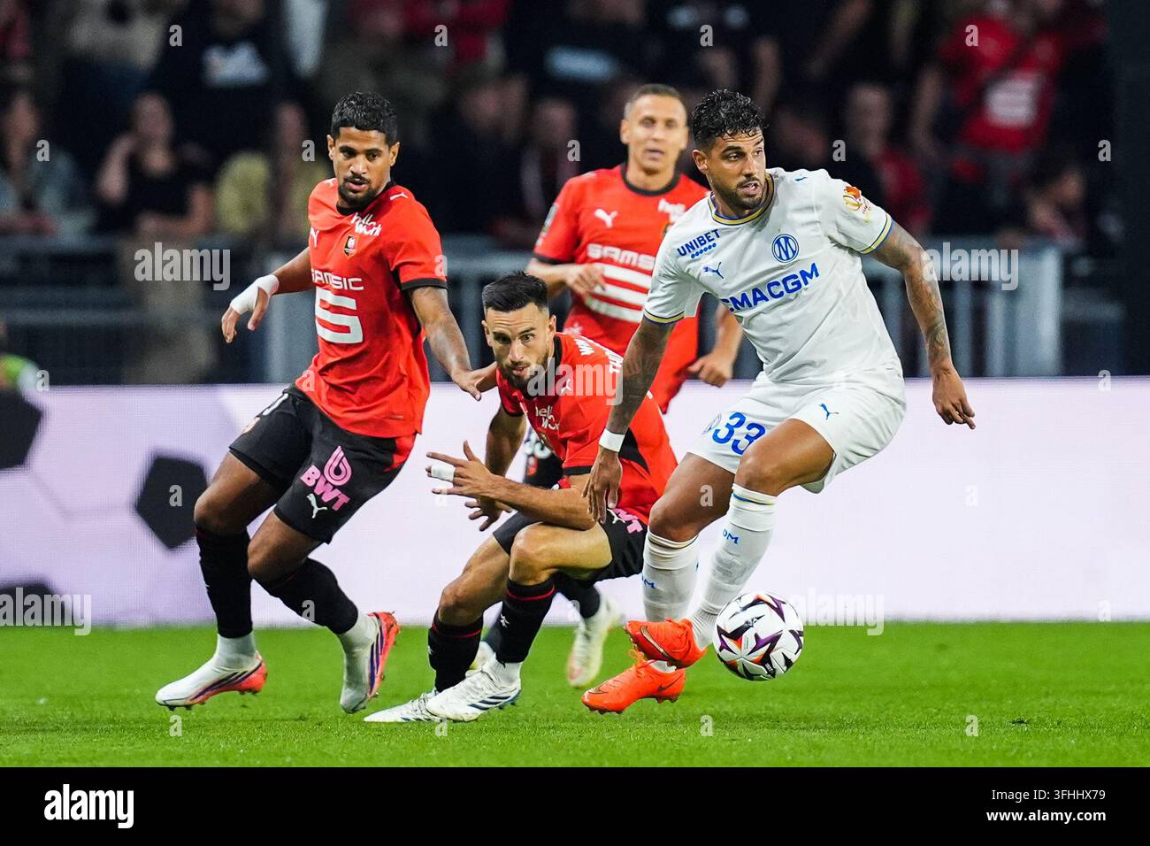EMERSON of Marseille and Adrien THOMASSON,Ludovic BLAS of Rennes during ...