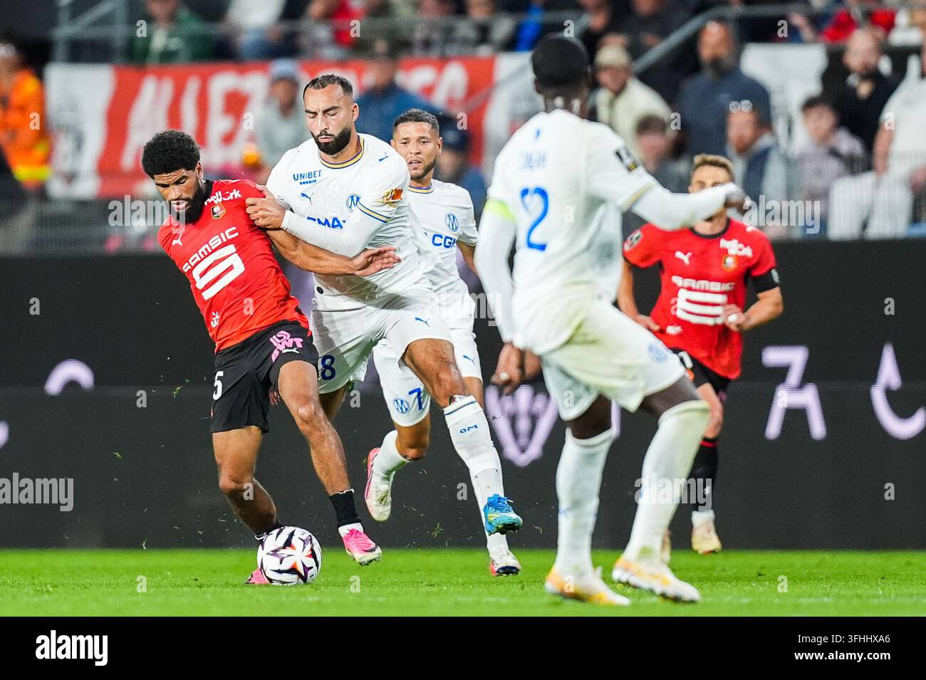 Mahdi CAMARA of Rennes and Himad ABDELLI of Marseille during the Ligue ...