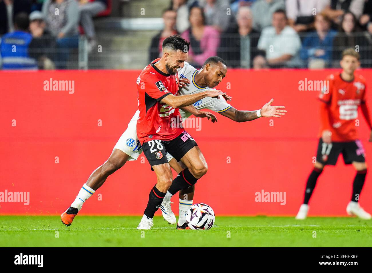 Adrien THOMASSON of Rennes and Igor PAIXAO of Marseille during the ...