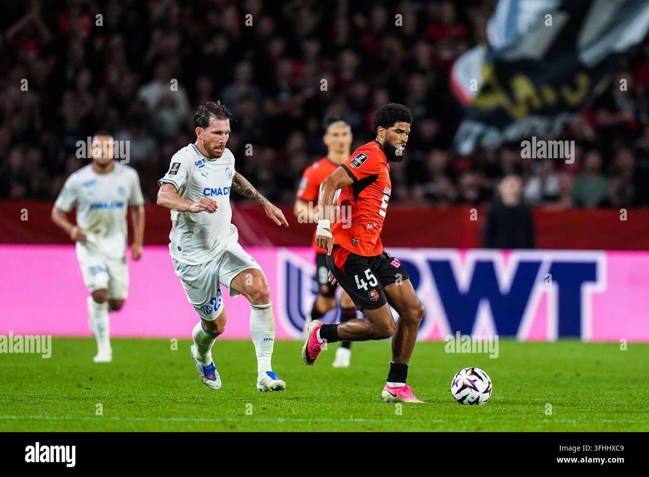 Mahdi CAMARA of Rennes and Pierre-Emile HOJBJERG of Marseille during ...