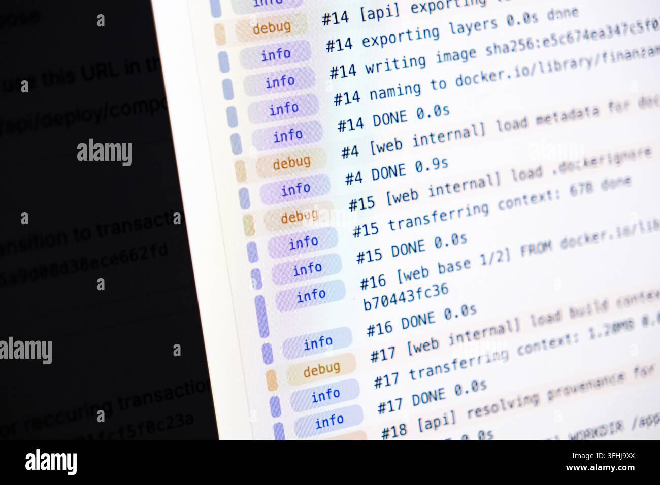 Terminal command logs running on a digital screen, highlighting automated process steps for technical developers who seek professional solutions in we Stock Photo