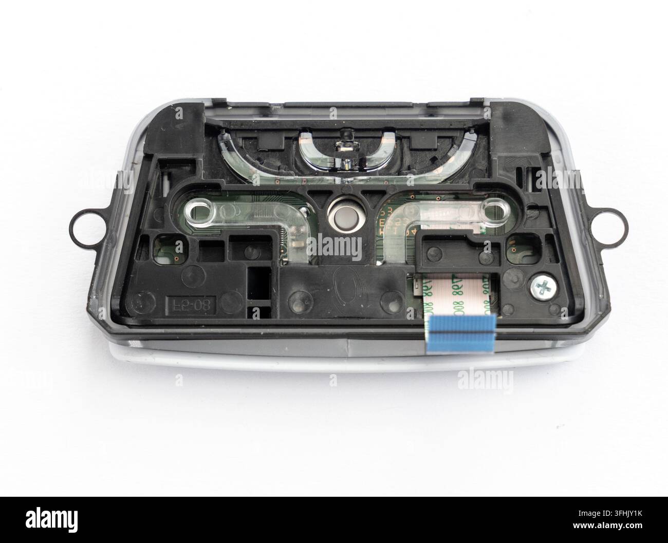 An electronic module with exposed circuit board on a clean white surface Stock Photo