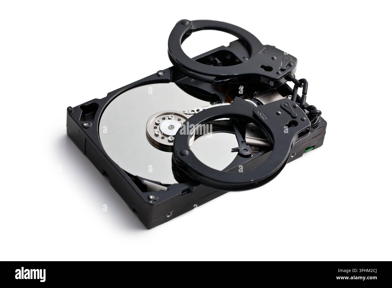 handcuff with hard disk on white background Stock Photo