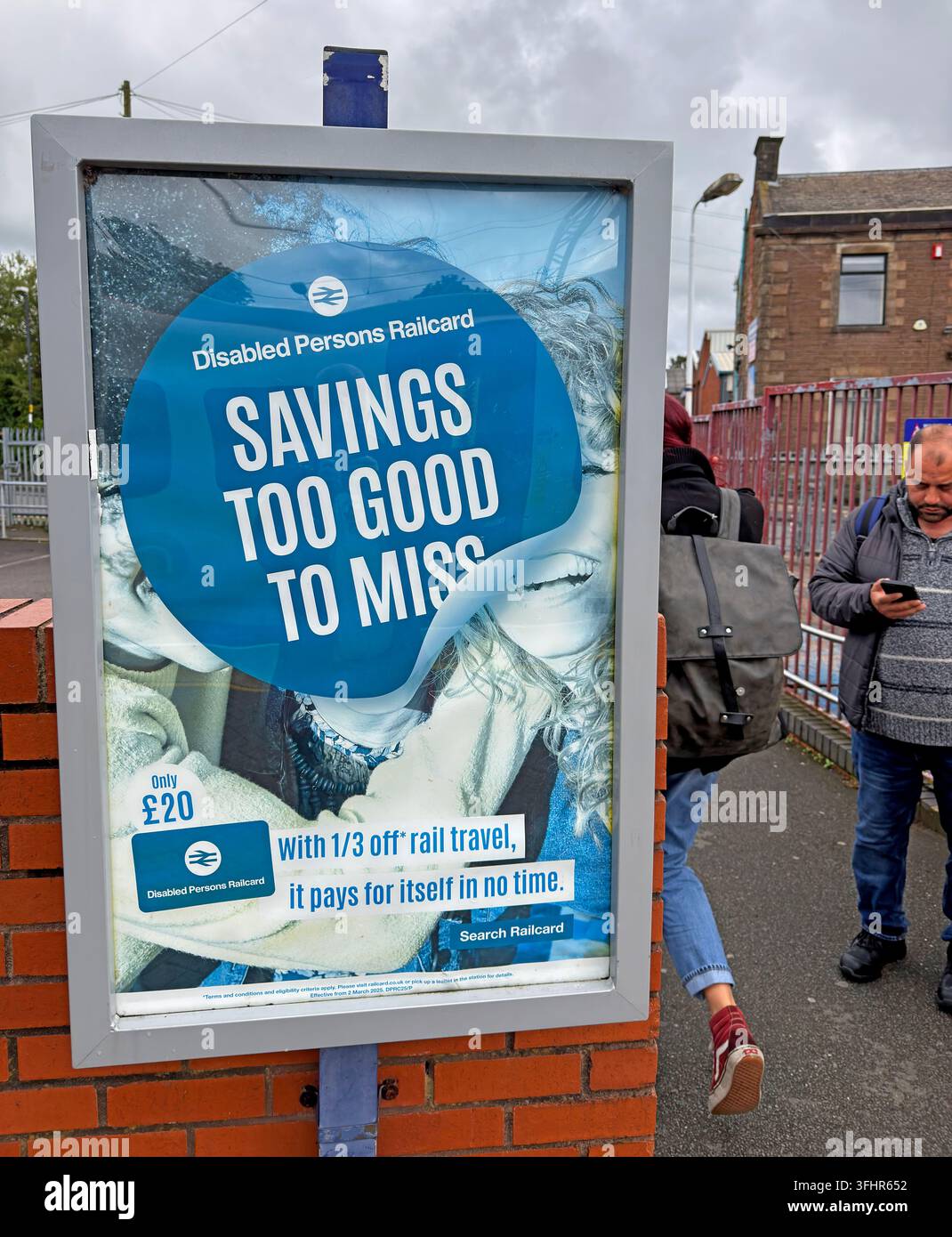 Disabled Persons Railcard 'Savings Too Good to Miss' advertising poster displayed in Chorley, Lancashire. Stock Photo
