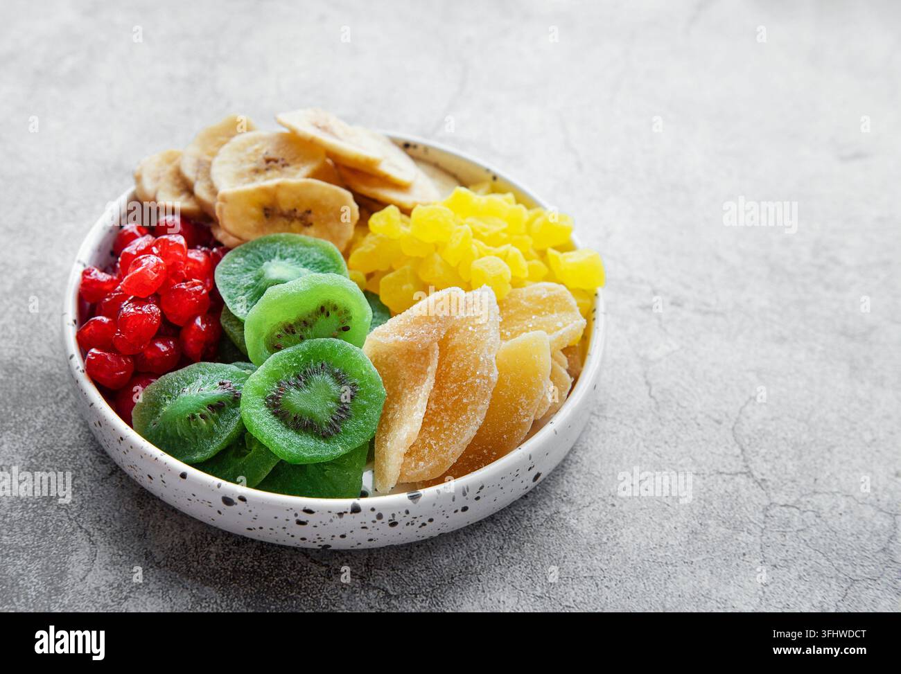 Bowl with various dried fruits Stock Photo
