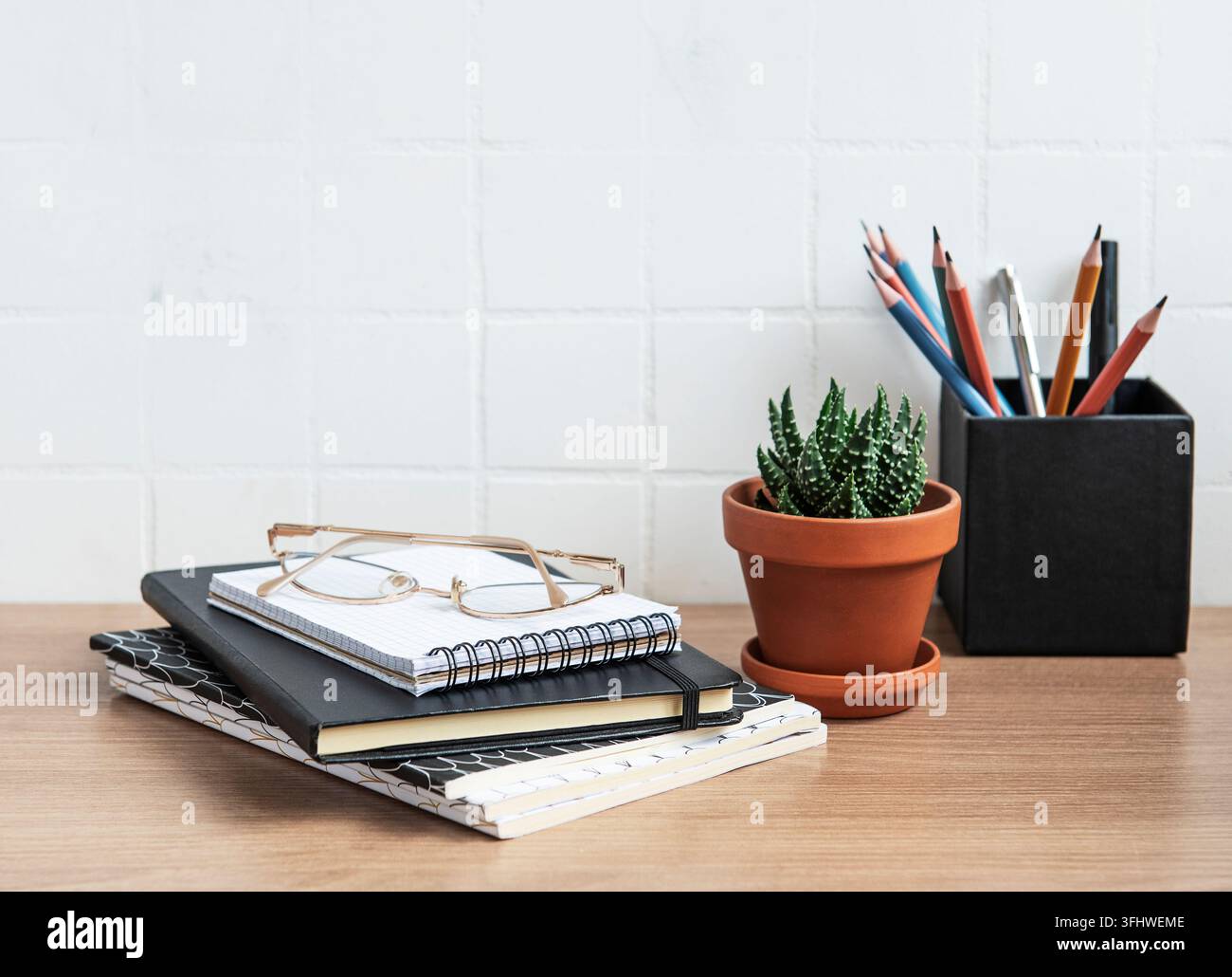 Office desk table with notebooks Stock Photo