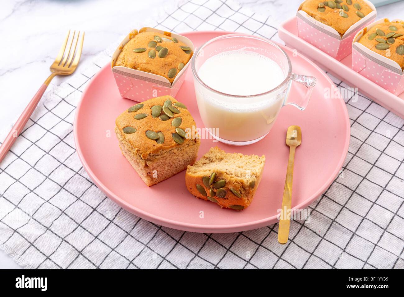 Date Nut Cupcakes Topped with Pumpkin Seeds Stock Photo