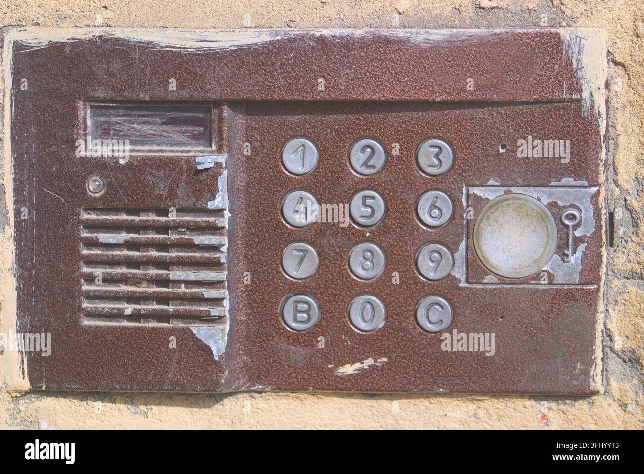 Old intercom in the entrance close-up. Stock Photo