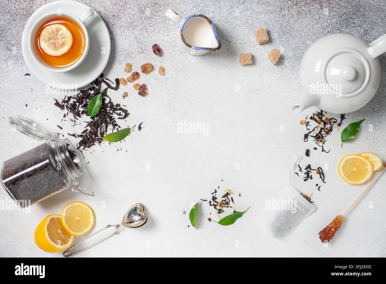 Tea composition on light grey background. Flat lay. Top view. Banner Stock Photo