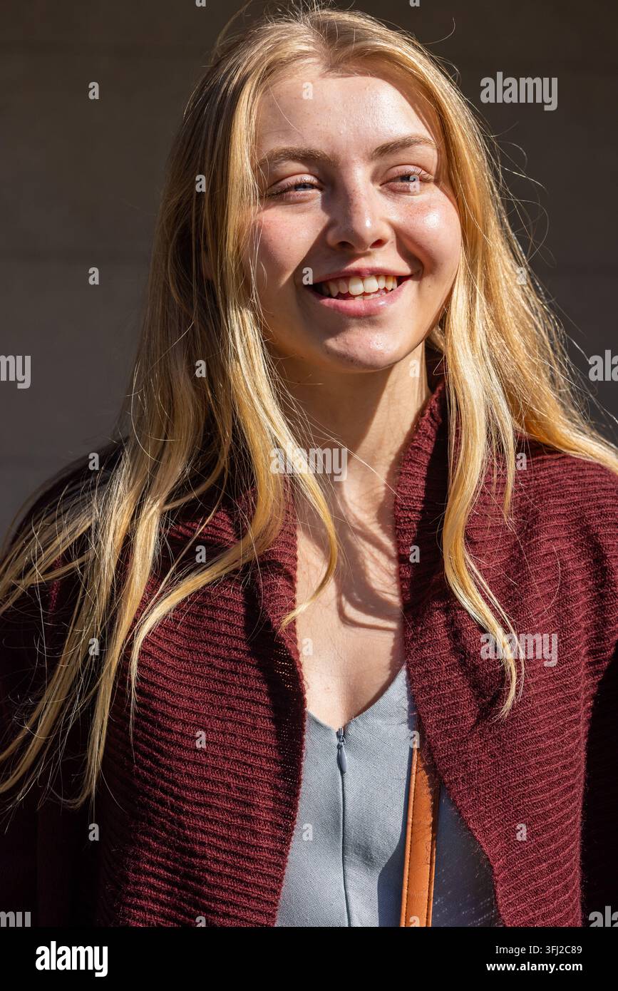 Woman in maroon off hi-res stock photography and images - Alamy