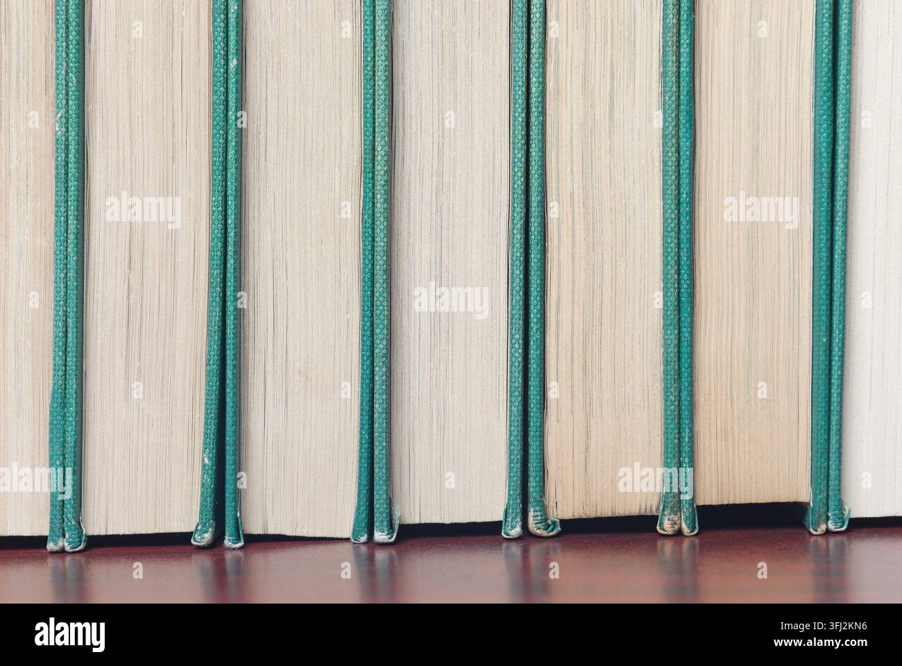 old encyclopedia books on shelf Stock Photo