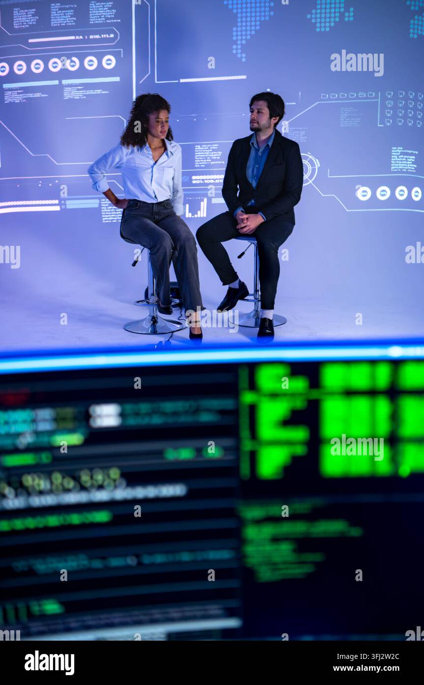 Technology professionals discussing AI software development with coding interface and global digital network visualization in a modern innovation work Stock Photo