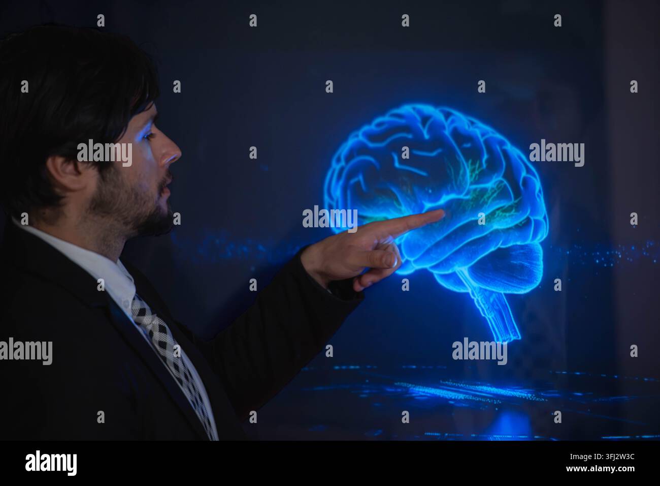 Business professional interacting with a digital human interface, representing artificial intelligence, machine learning, human technology collaborati Stock Photo