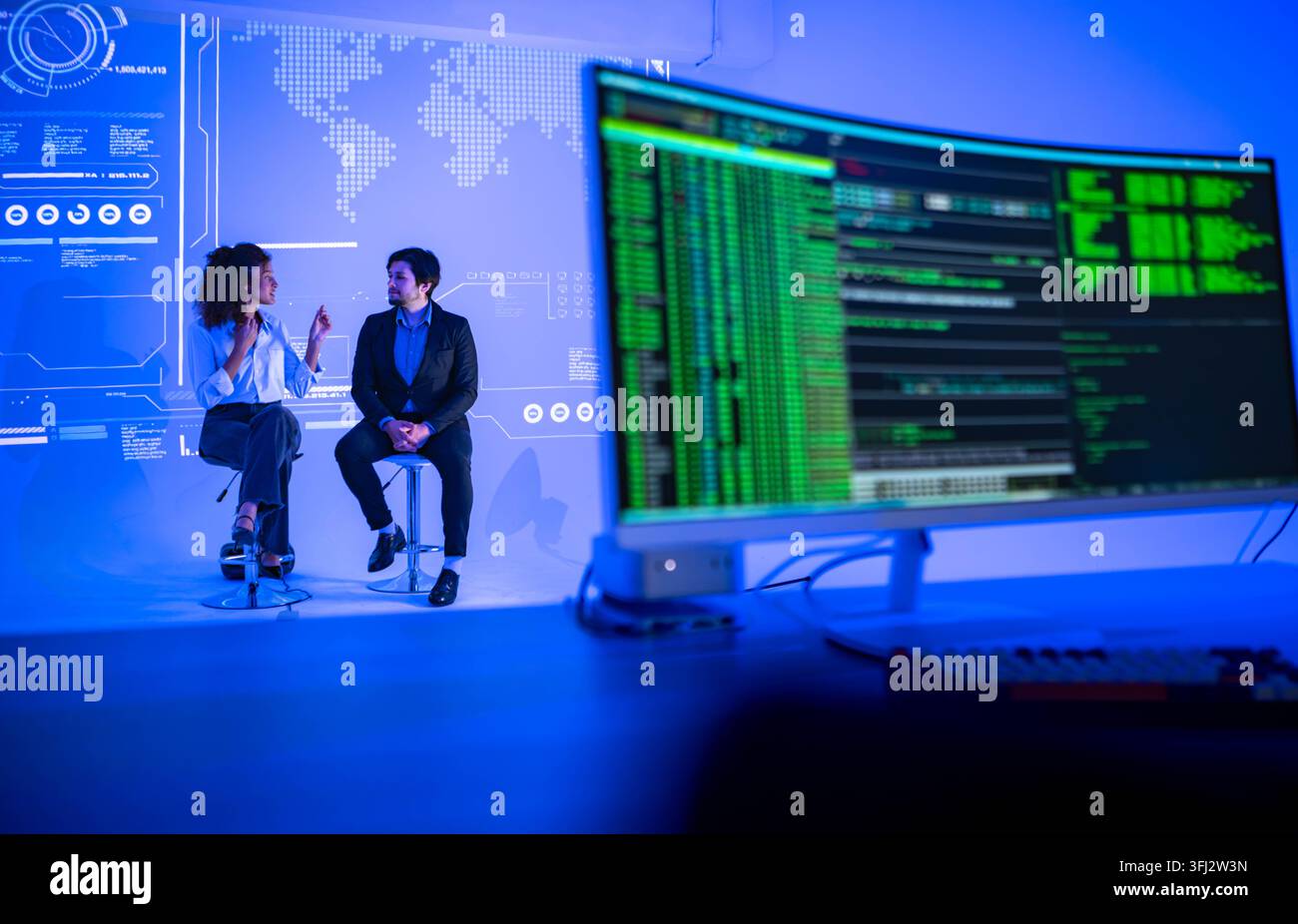 Technology professionals discussing AI software development with coding interface and global digital network visualization in a modern innovation work Stock Photo