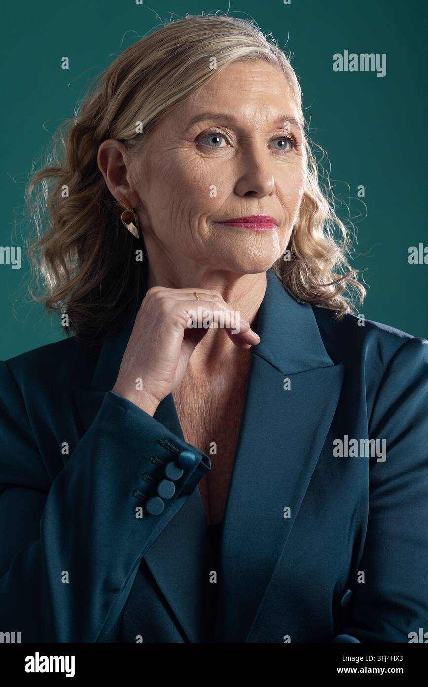 Woman wearing blazer gazing hi-res stock photography and images - Alamy