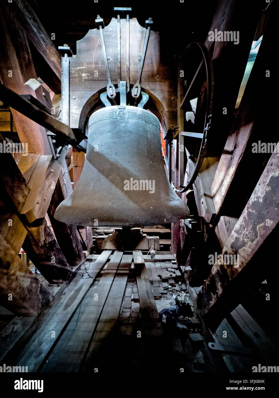Large church bell inside the tower of the Church of Our Saviour, Vor Frelsers Kirke, in Christianshavn, Copenhagen. Stock Photo