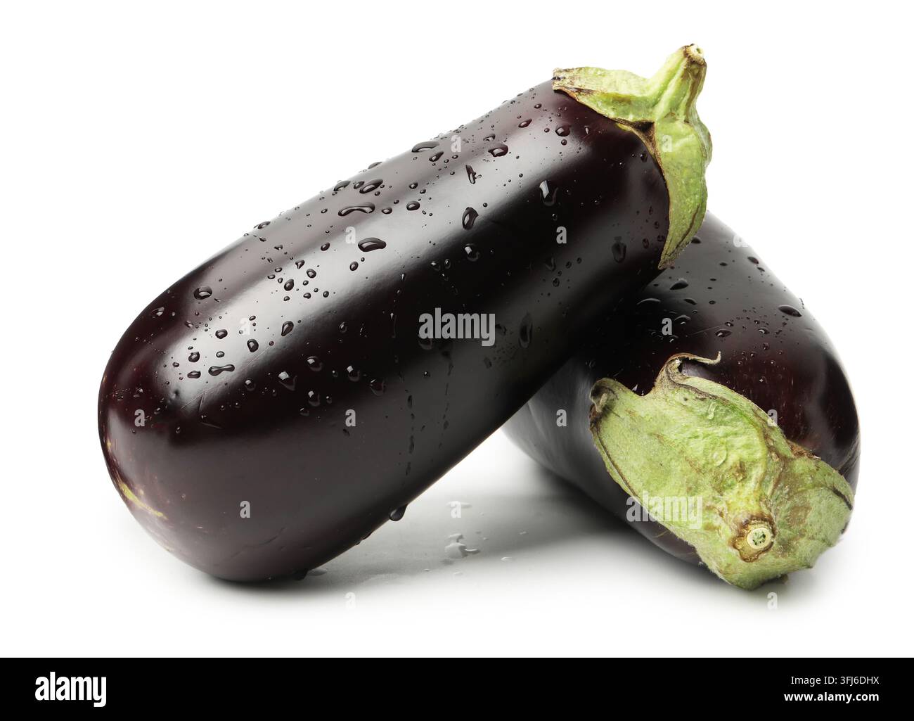 Two ripe eggplants with water drops isolated on white Stock Photo