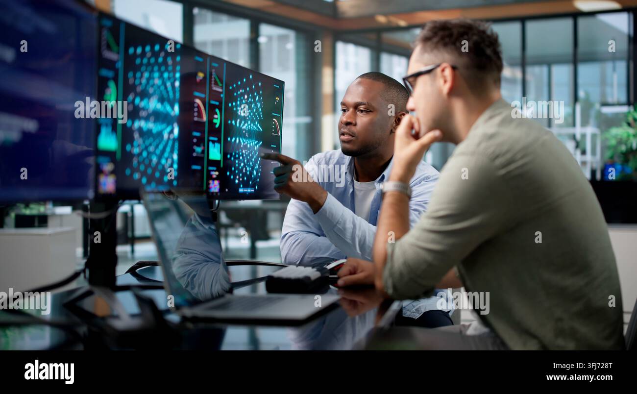 Machine Learning Engineer And Data Scientist Develop AI Models Using Laptop. Stock Photo