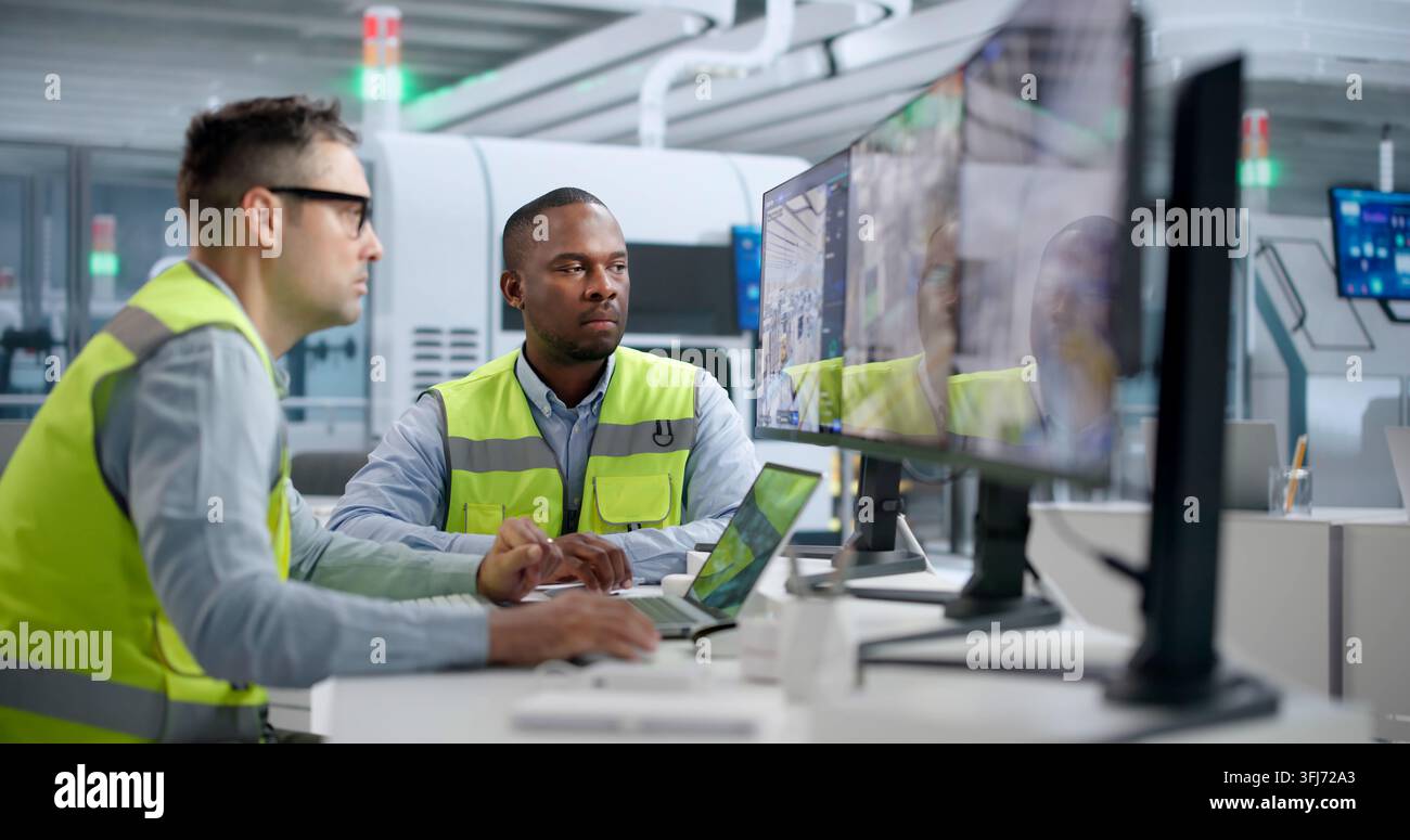 Engineer Uses SCADA Software For Real-time Monitoring And Predictive Simulation. Stock Photo