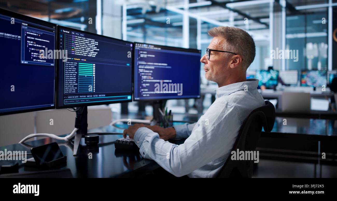 Software Developer Carefully Debugging Code In Cloud-based Programming Workspace. Stock Photo