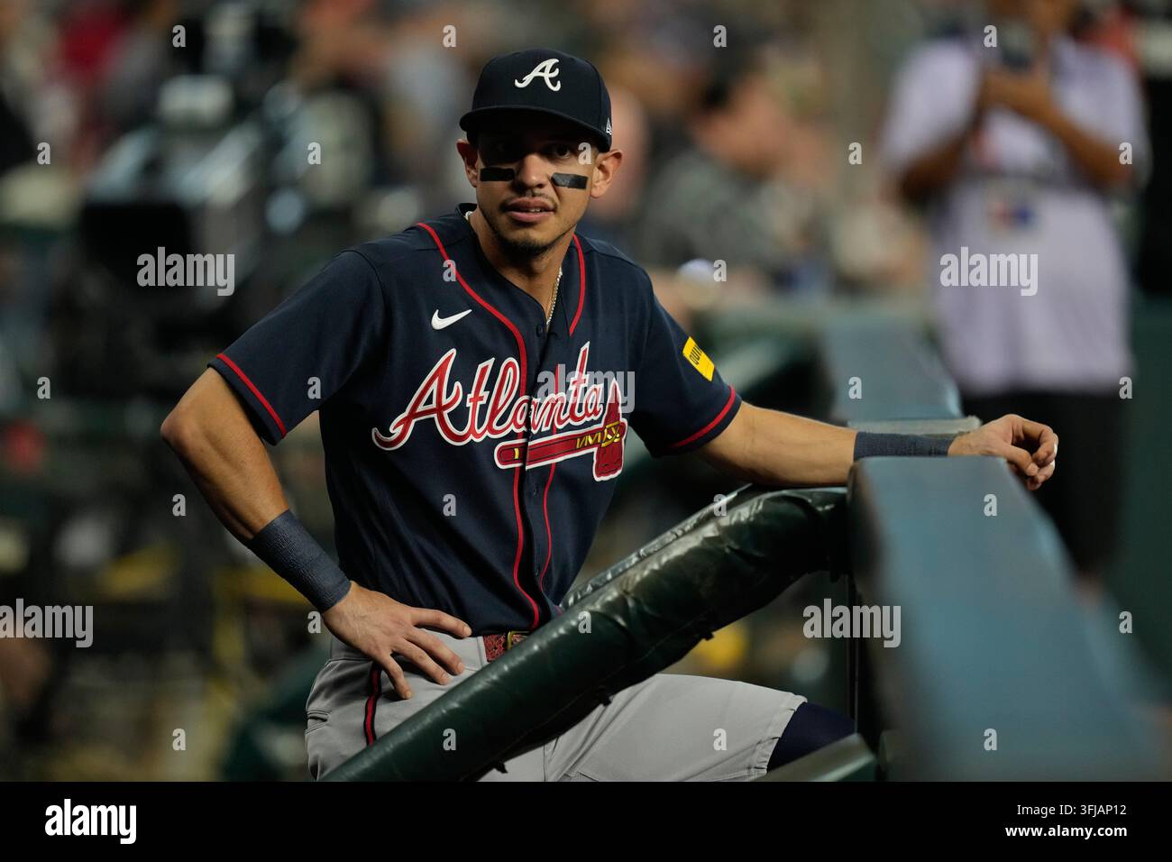 - using using using using using using using using... Atlanta Braves shortstop Maricio Dubon stands in the dugout before a ...