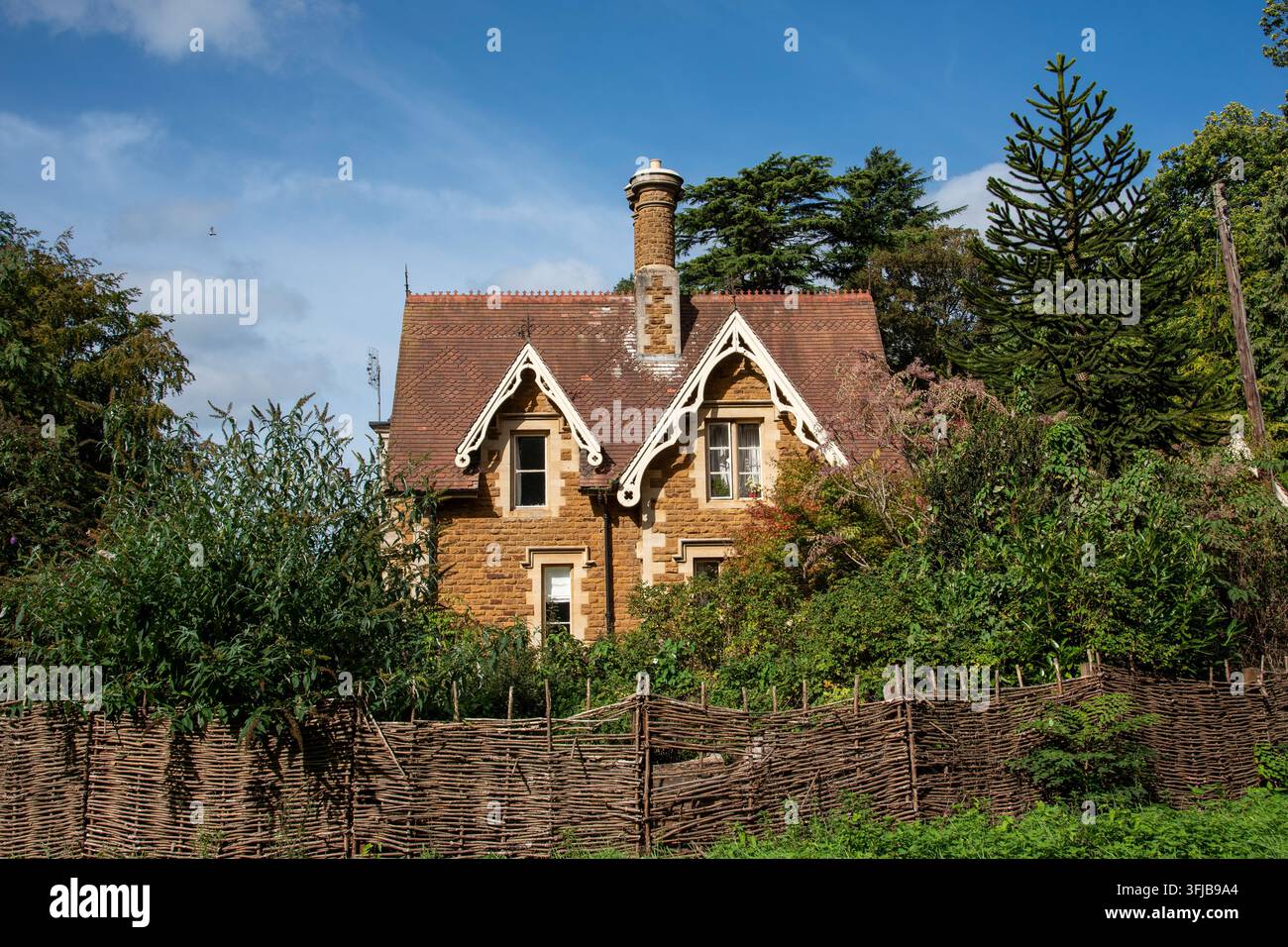 Traditional english red brick cottage hi-res stock photography and